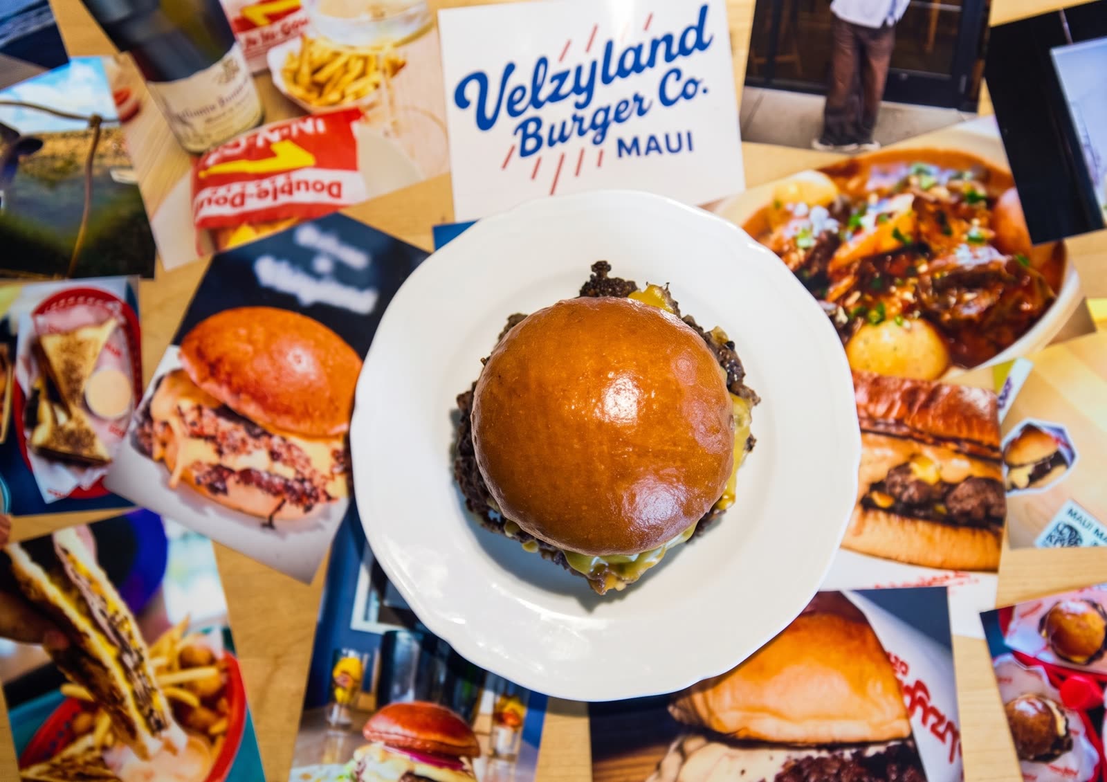 Velzy Burger from above, Velzyland Burger Co. Maui card in frame